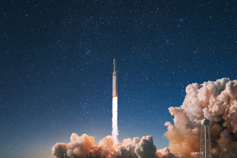 New modern rocket with smoke and blast successfully lift off int