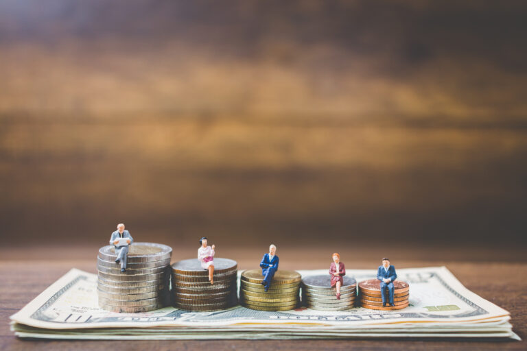 tiny-figures-on-money-representing-financial-hiera-2026-01-11-09-12-55-utc